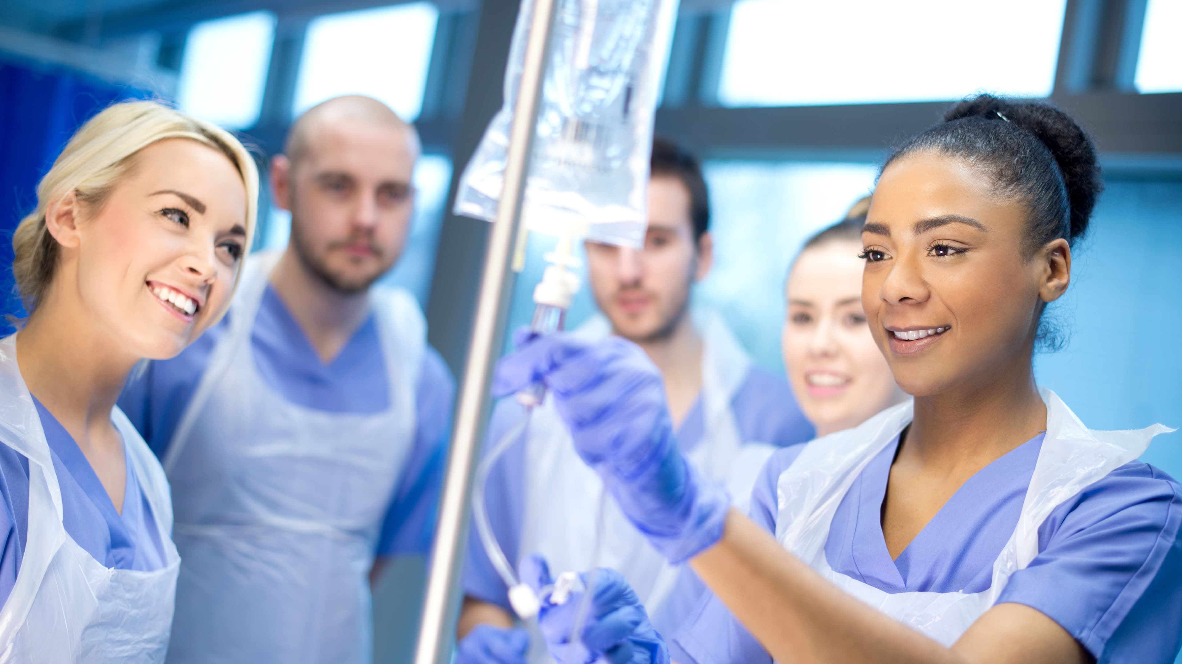 Young student learning in hospital setting.
