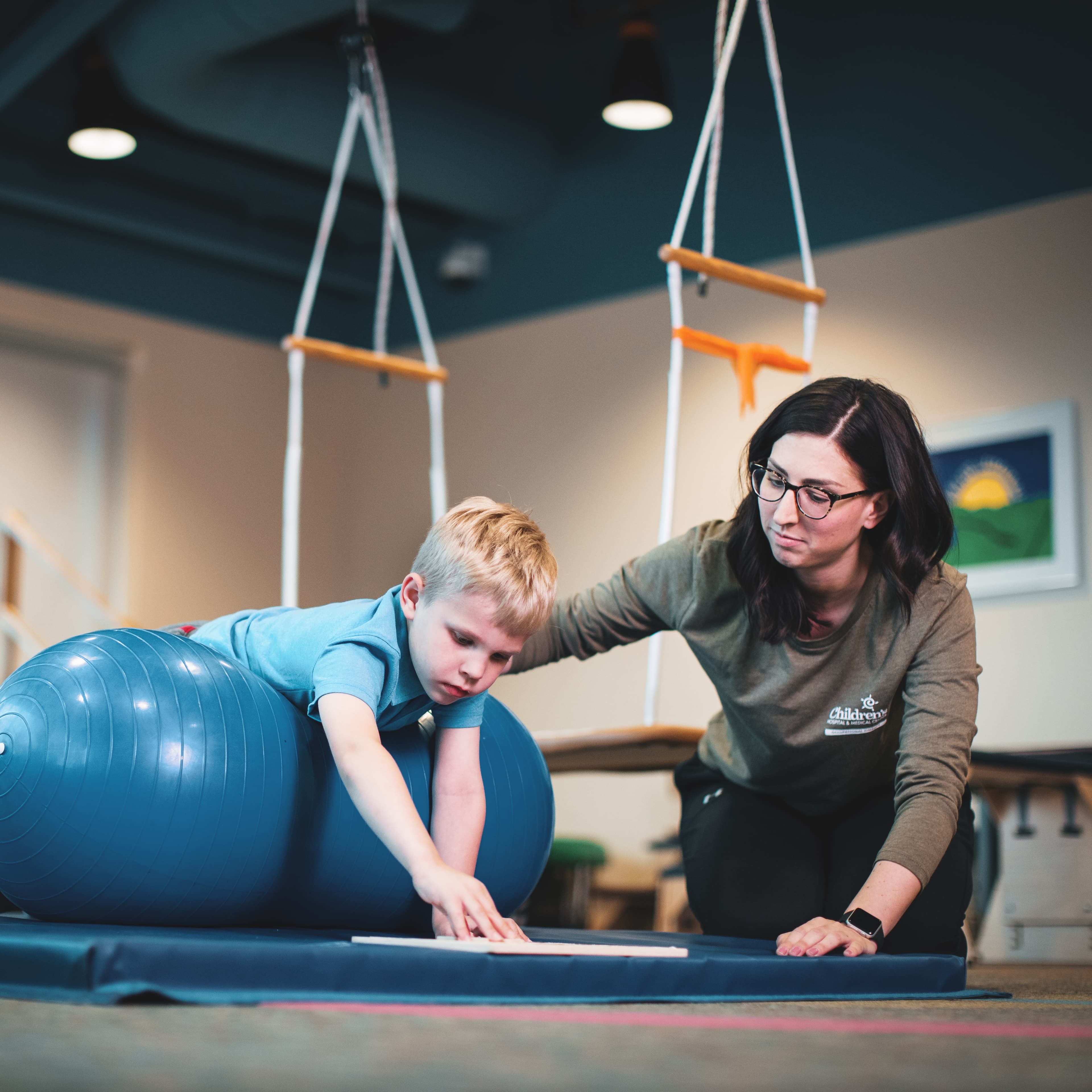 Children's provider working with young child.
