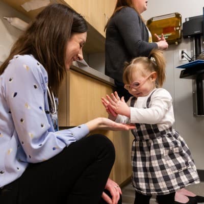 Children's Nebraska Provider working with young patient.